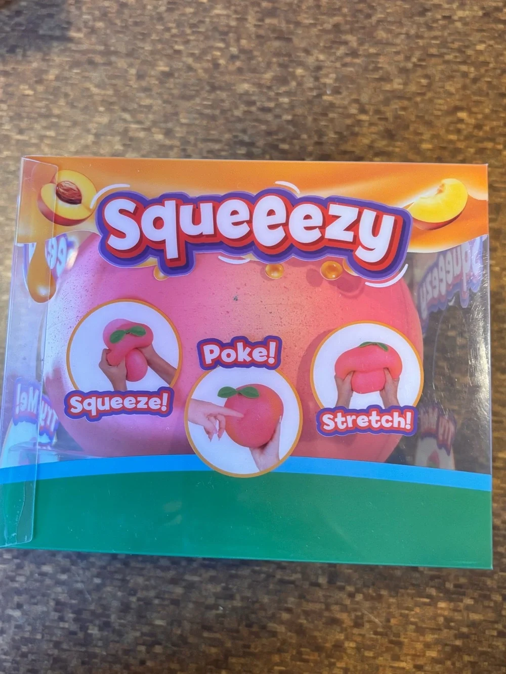 Squeeezy Peach Toy - Picture 2 of 4